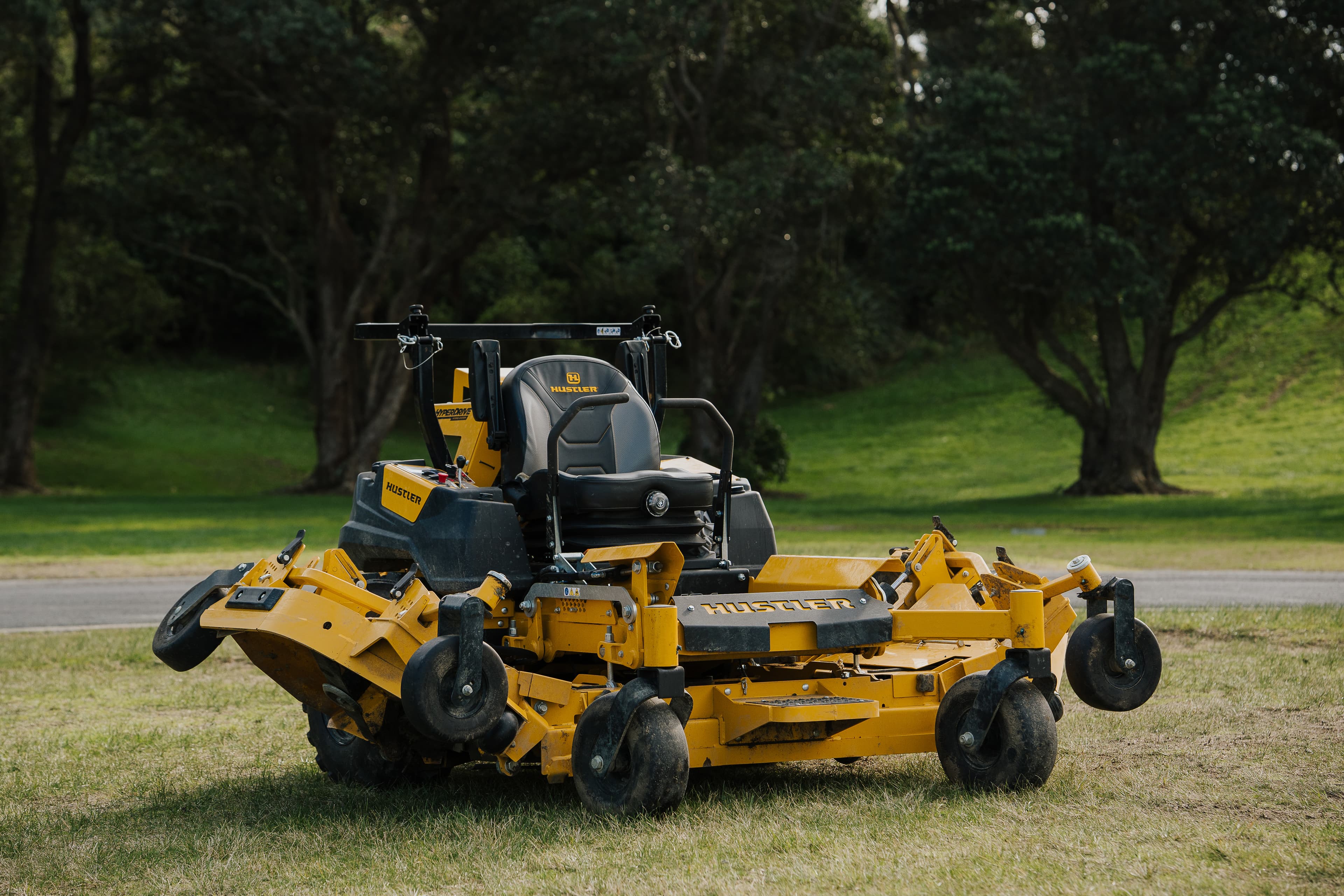 Bea the Hustler ride-on mower with the rear discharge chute closed